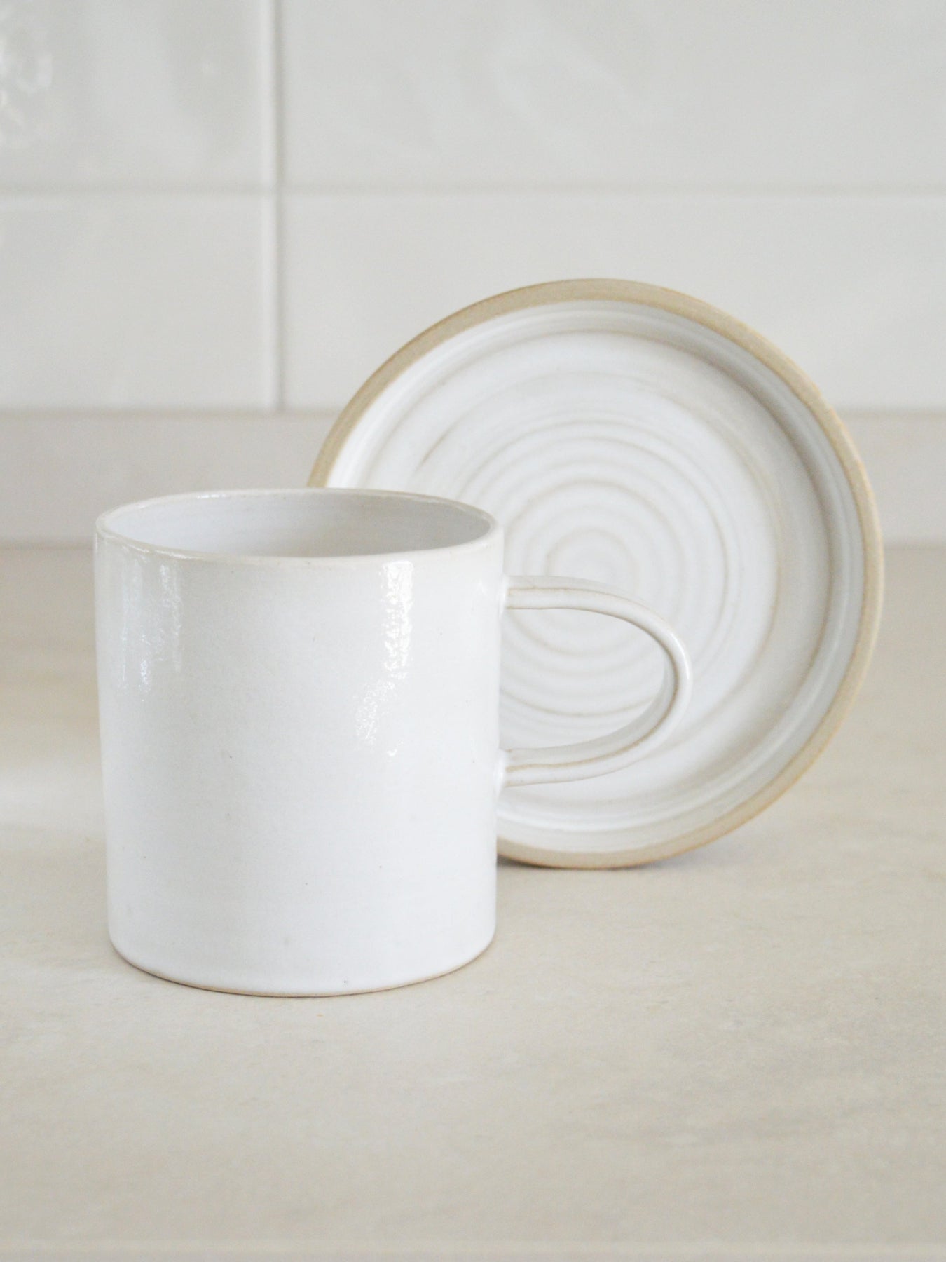 NUDE Set di tazza e piatto da colazione in grès